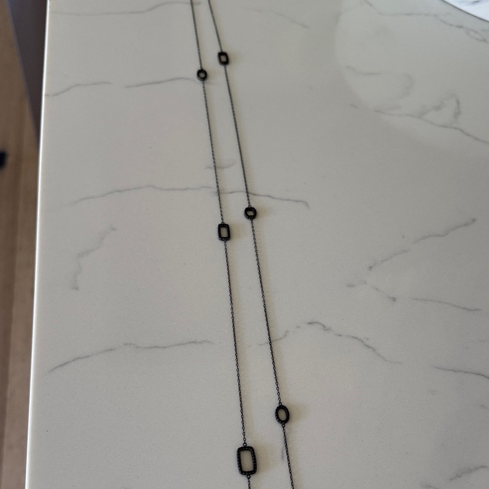 Sleek Black Necklace with Geometric Accents